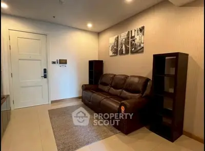 Cozy living room with leather sofa and modern decor