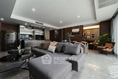 Luxurious modern living room with open kitchen and stylish decor