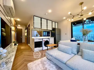 Modern living room with open kitchen and stunning city view balcony
