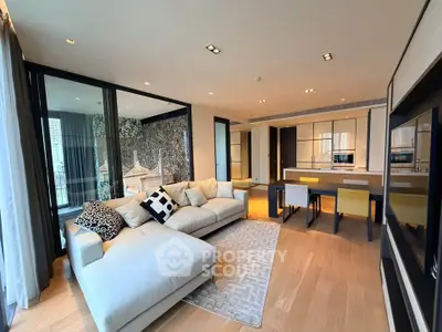 Luxurious open-plan living room with modern kitchen and elegant decor