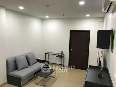 Modern living room with minimalist furniture and neutral tones