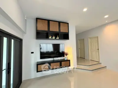 Modern living room with sleek TV setup and stylish decor