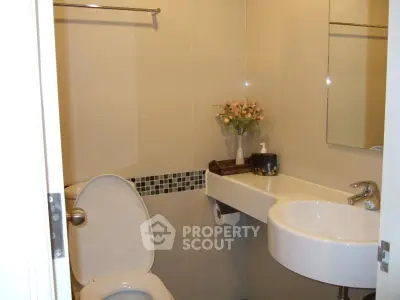 Modern bathroom with sleek fixtures and elegant decor