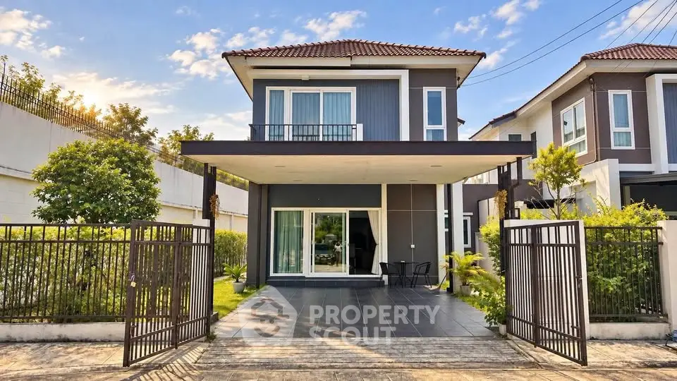 Modern two-story house with spacious driveway and lush greenery, perfect for family living.