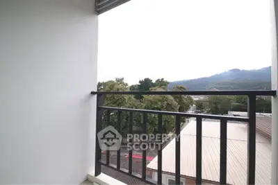 Charming balcony with scenic mountain view, perfect for relaxation and enjoying nature.