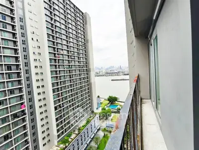 High-rise apartment balcony with stunning city and river view