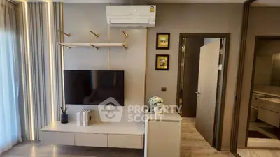 Modern living room with wall-mounted TV and air conditioning unit