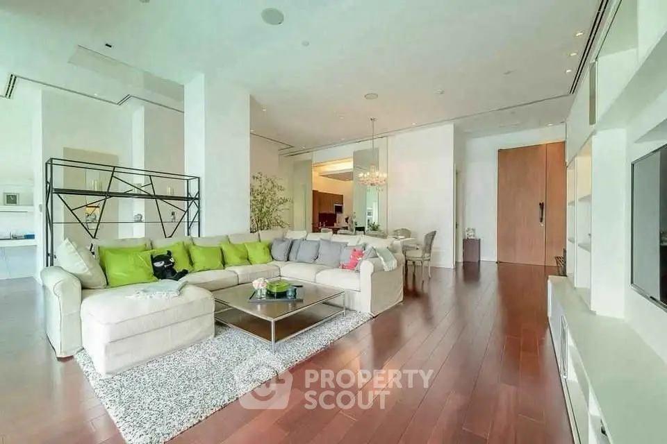 Spacious modern living room with elegant decor and hardwood floors