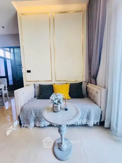 Stylish living room with elegant sofa and chic decor in modern apartment