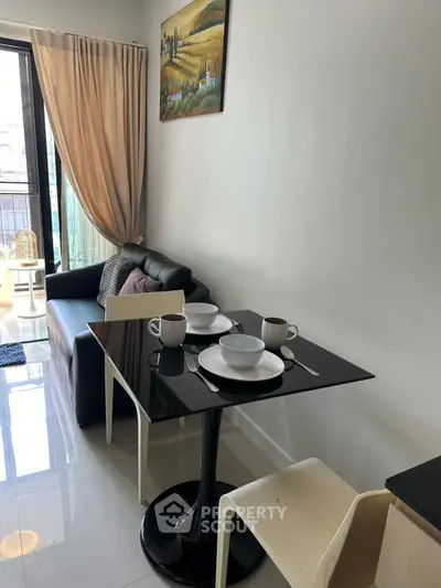 Modern living room with dining area and natural light