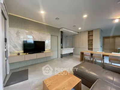 Modern living room with open layout and stylish furniture