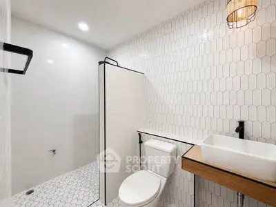 Modern bathroom with stylish tile design and contemporary fixtures