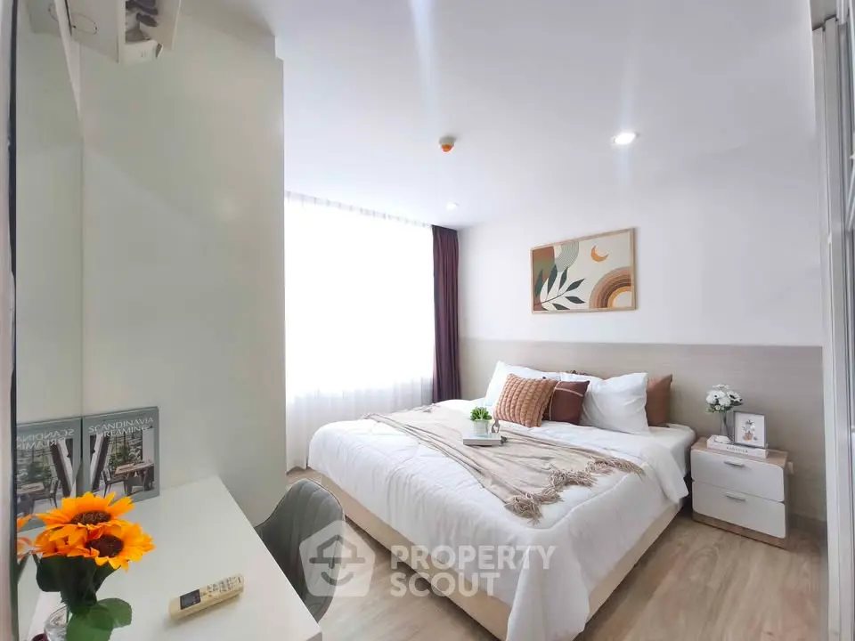 Bright and cozy bedroom with modern decor and natural light