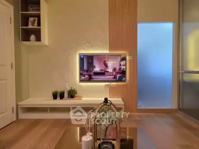 Modern living room with stylish decor and ambient lighting