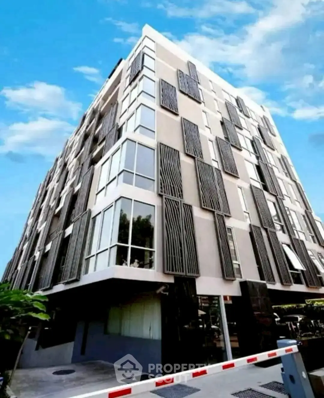 Modern architectural building with unique facade design and large windows