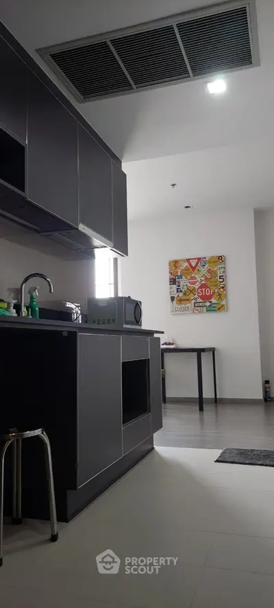 Modern kitchen with sleek cabinets and contemporary decor
