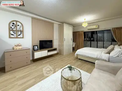 Spacious modern bedroom with elegant decor and city view in Pattaya condo