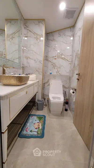 Luxurious marble bathroom with modern fixtures and elegant design