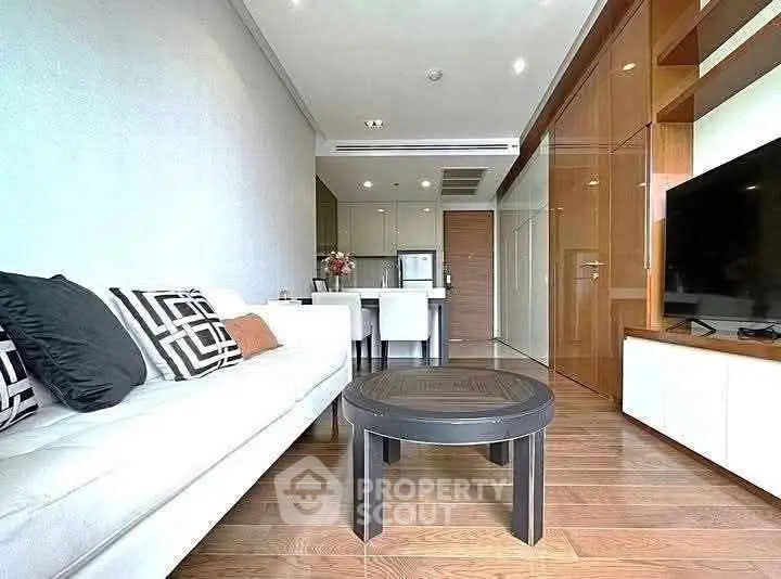 Modern living room with sleek furniture and open layout, perfect for contemporary living.