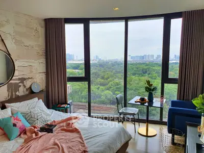 Luxurious bedroom with panoramic city view and stylish decor in modern apartment.