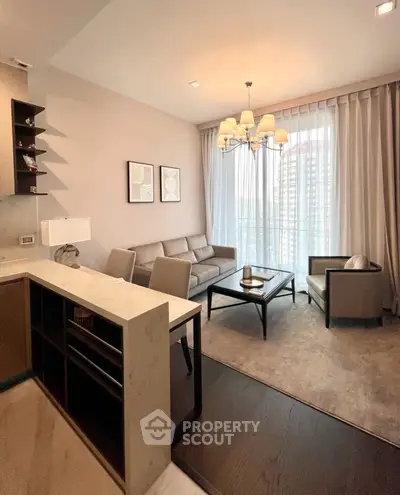 Elegant living room with modern furniture and large windows offering city view