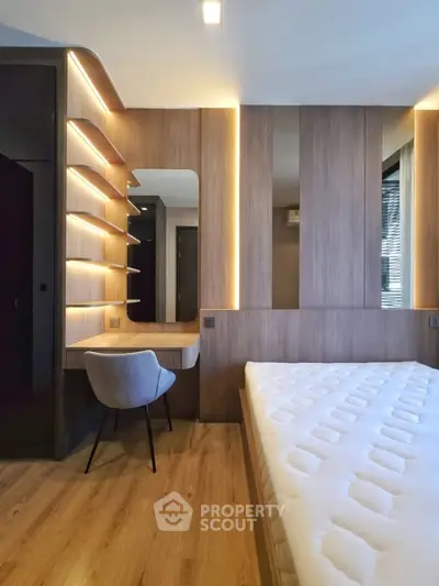 Modern bedroom with stylish wooden paneling and cozy lighting