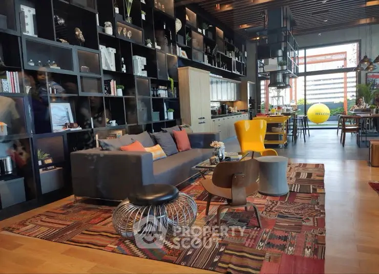 Stylish modern living room with open kitchen and unique decor elements