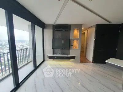 Luxurious modern living room with panoramic city view and sleek marble flooring.