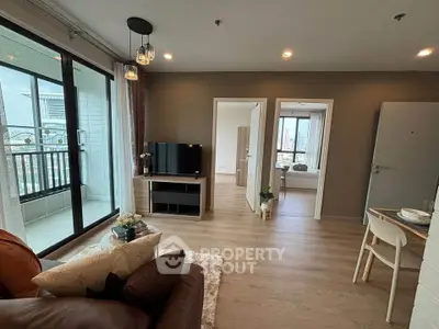 Modern living room with balcony view in stylish apartment