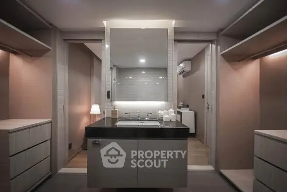 Luxurious modern bathroom with sleek design and ambient lighting