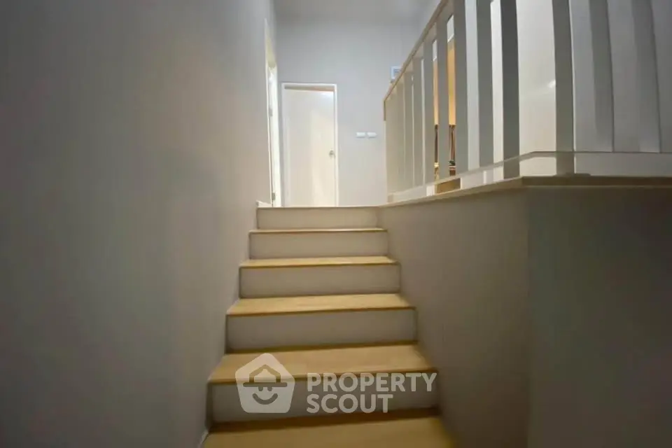 Modern staircase with sleek railing in a contemporary home interior