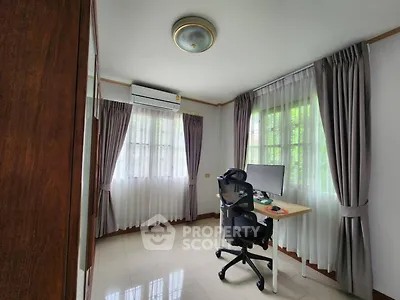 Bright study room with modern desk and ergonomic chair, ideal for productivity.