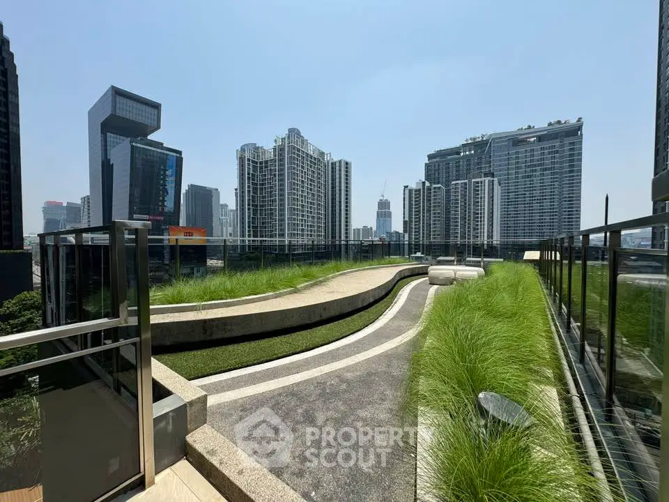 Stunning rooftop garden with city skyline view, perfect for relaxation and urban living.