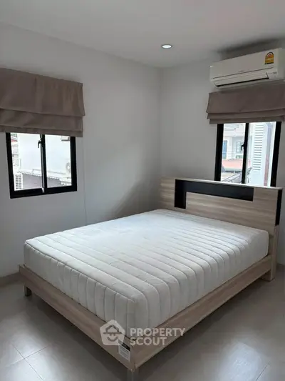 Modern bedroom with minimalist design and natural light