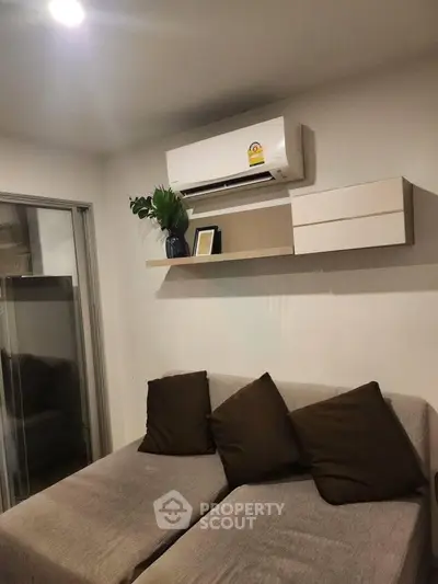 Cozy living room with modern air conditioning and stylish decor
