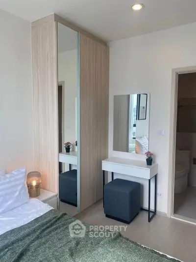 Modern bedroom with stylish decor and compact design