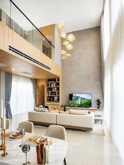 Luxurious modern living room with high ceilings and elegant decor