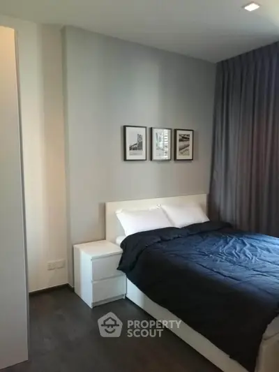 Modern bedroom with sleek design, featuring a cozy bed and stylish decor, perfect for relaxation and comfort.