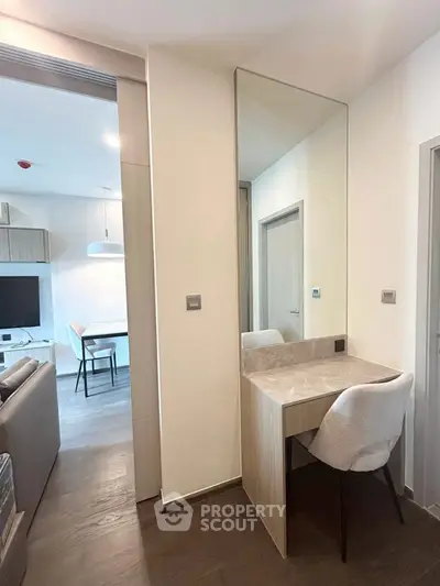 Modern apartment interior with stylish vanity and open living area