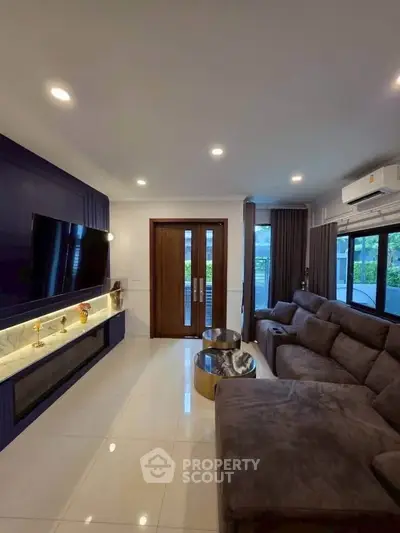 Luxurious living room with modern decor and large sectional sofa