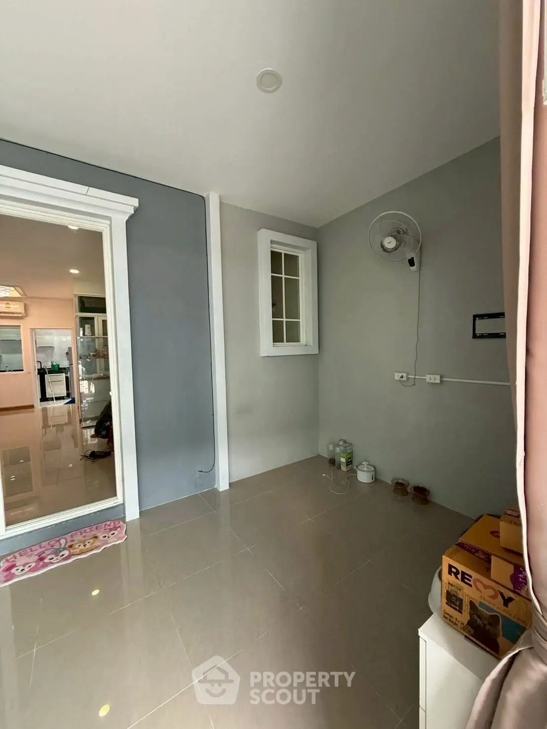 Spacious interior with modern design and ample natural light, perfect for versatile living space.