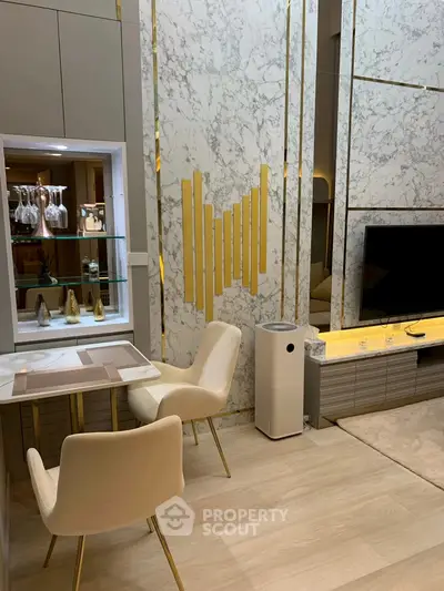 Luxurious modern living room with marble accents and elegant decor