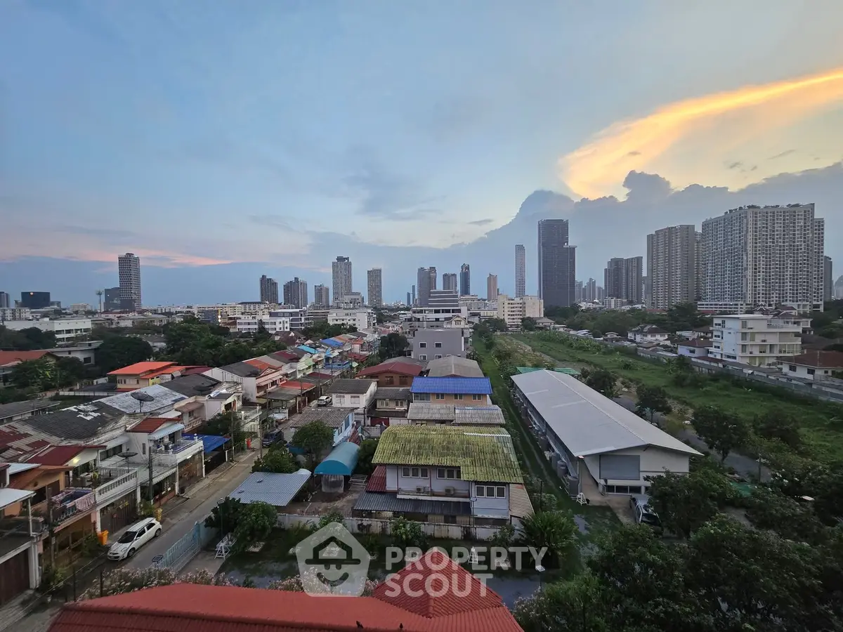 Stunning cityscape view showcasing diverse architecture and vibrant skyline at dusk.