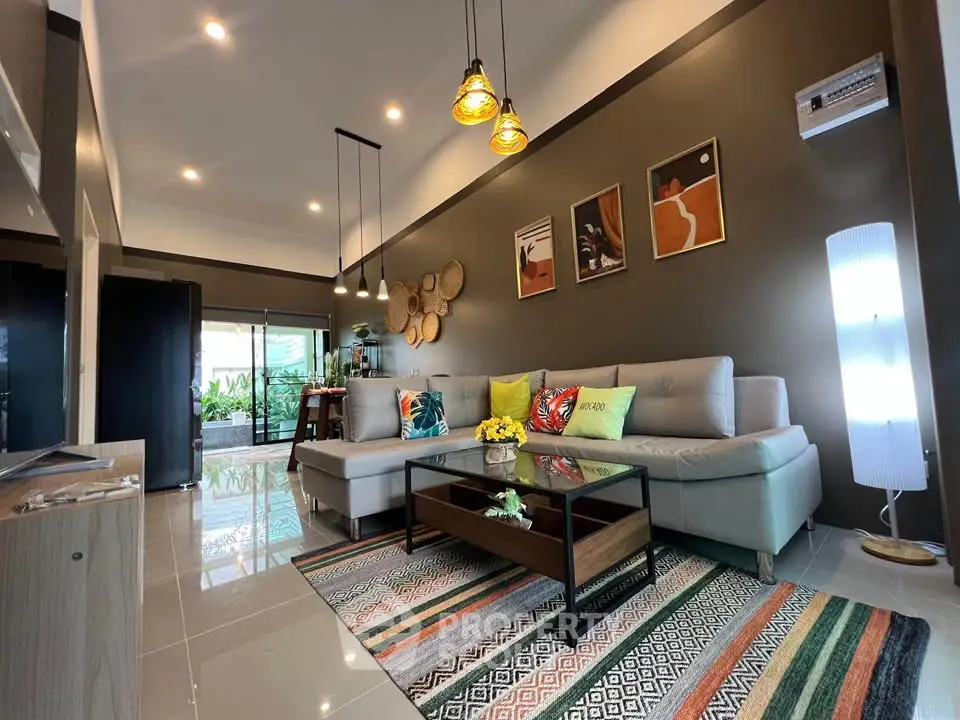 Stylish modern living room with cozy sectional sofa and chic decor