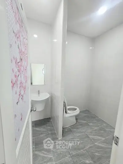 Modern bathroom with sleek tiles and minimalist design