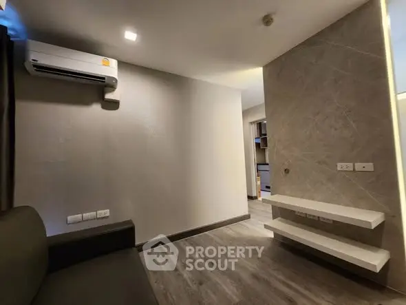 Modern living room with sleek air conditioning and minimalist design