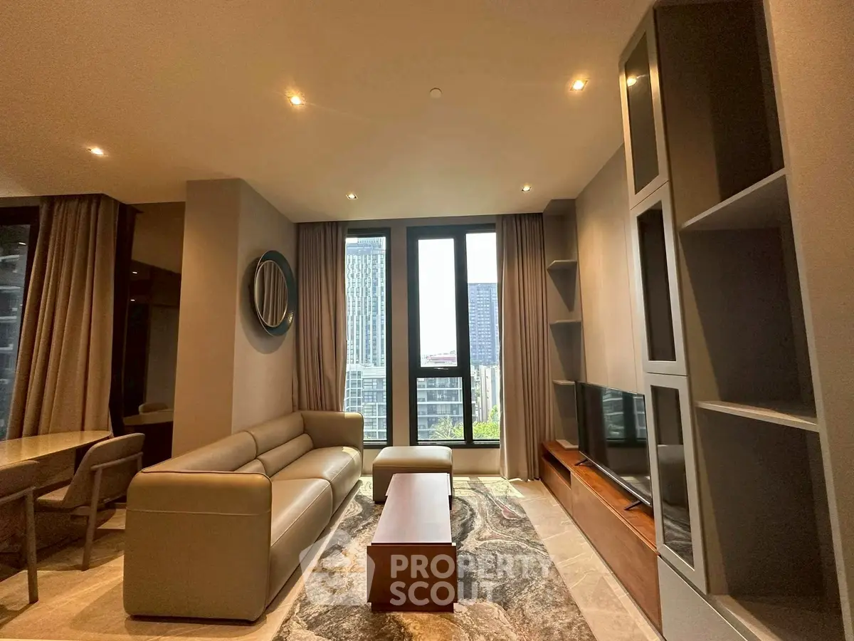 Luxurious modern living room with city view, featuring elegant furniture and stylish decor.