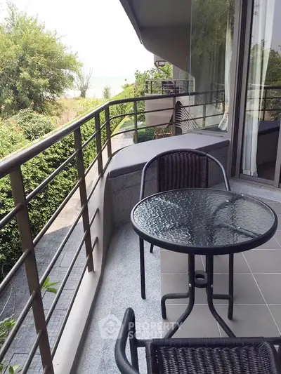 Charming balcony with ocean view, perfect for relaxation and enjoying the sea breeze.