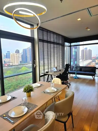 Stunning modern living room with panoramic city views and elegant dining area.