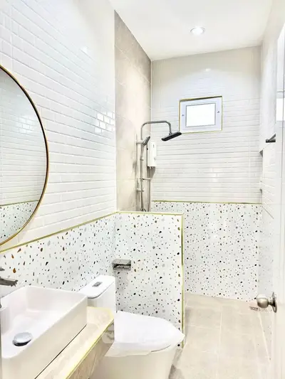 Modern bathroom with stylish terrazzo tiles and sleek fixtures